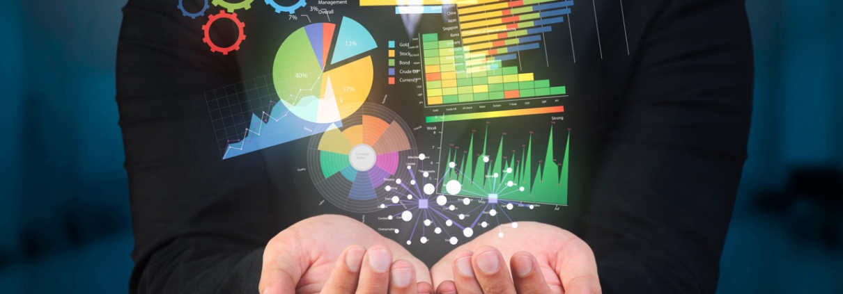 businessman holds up data visualization examples